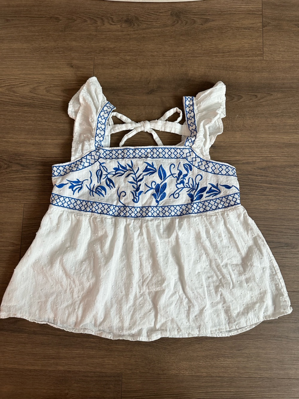 White Embroidered Flutter Sleeve Top with Blue Floral Detail